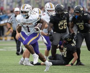 Plum’s C.J. Hart breaks away from the Gateway defense on a long run during a game <ins>Friday, </ins>Sept. 5<ins>,</ins> at Gateway.