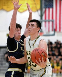 Penn-Trafford’s Zach Feldman works against Franklin Regional’s Dylan Carr on Dec. 13, 2024, in Harrison City.