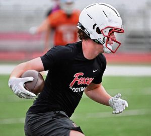 Fox Chapel’s Max Melocchi scores a touchdown against Armstrong during a 7-on-7 competition in July.