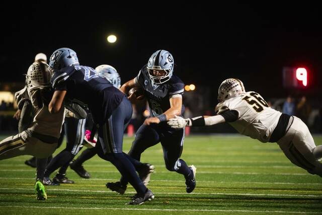Central Valley’s Ethan Shearer runs the ball past Highlands during their WPIAL Class 3A quarterfinal Friday at Central Valley High School.