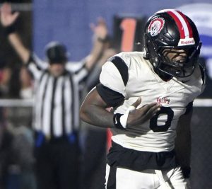 Aliquippa’s Cleaster Longmire celebrates after scoring the Quips’ second touchdown against New Castle during their WPIAL Class 4A semifinal on Friday, Nov. 7, 2025, at Helling Stadium in Ellwood City.