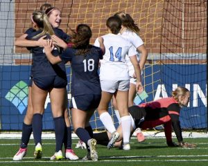 Freeport’s Elena Jenkins celebrates with teammates after scoring against Burrell during the WPIAL Class 2A championship game Nov. 1, 2025, at Highmark Stadium.