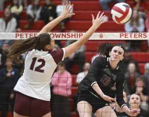 Oakland Catholic’s Rory O’Connell hits against Beaver’s Kailyn Connelly during the WPIAL Class 3A volleyball championship match Nov. 1 at Peters Township.