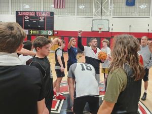 Ligonier Valley boys basketball coach Dante Porter talks to his team at practice.
