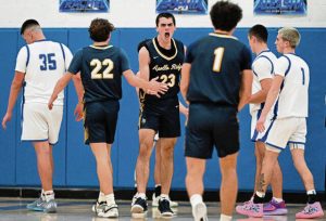 Apollo-Ridge’s Brayden Myers reacts to a basket and one against Leechburg last season.