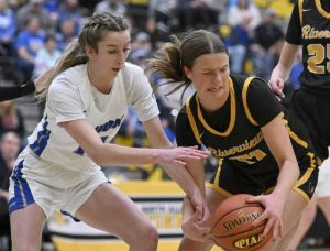 Union’s Kelly Cleaver fights for a loose ball with Riverview’s Juliette Brun during a 2024 WPIAL Class A semifinal.