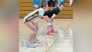 Quaker Valley's Ella Palmer (left) and Megan Harris compete during the 2025 season.