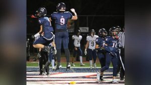 Shaler’s Braedyn Witkowski (7) and Zach London (9) celebrate following a touchdown against Kiski Area on Oct. 31 at Shaler.
