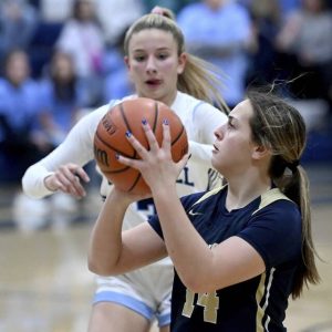 Freeport’s Nia DiSanti shoots a 3-pointer next to Burrell’s McKenna Miller during their game on Thursday, Jan. 30, 2025, at Burrell.