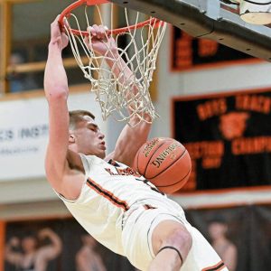 Latrobe’s Ian Decerb dunks against Uniontown on Tuesday, Dec. 17, 2024, at Greater Latrobe.