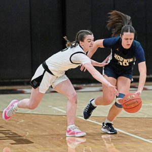 Norwin’s Ava Christopher steals the ball from Upper St. Clair’s Ryan Prunzik last season.