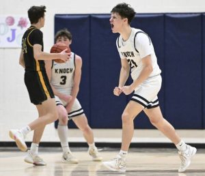Knoch’s Teegan Finucan celebrates after hitting back to back 3-pointers against Deer Lakes last season.