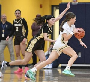 Highlands’ Kailah Jones defends on Freeport’s Cecelia Schlegel on Feb. 3.