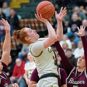 Blackhawk’s Aubree Hupp scores over Beaver’s Ava Wright on Jan. 16, 2024.