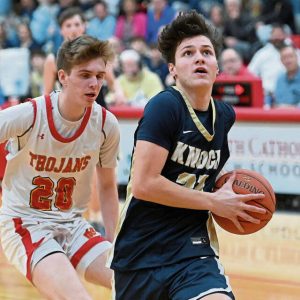 Knoch’s Teegan Finucan scores past North Catholic’s Owen Maddalon on Feb. 4.