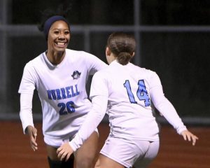 Burrell’s Makiah Buchak celebrates with Eva Wilson after defeating Freeport, 2-1, in their PIAA Class 2A state semifinal on Tuesday, Nov. 11, 2025, at Fox Chapel.