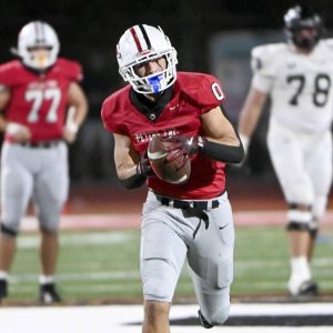 Peters Township’s Lucas Shanafelt catches a pass during the fourth quarter against Upper St. Clair on Sept. 26.
