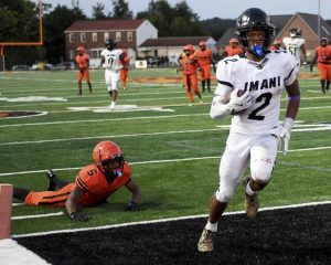 Imani Christian’s David Davis scores a second quarter touchdown against Clairton during their game on Friday, Aug. 22, 2025, at Tyler Boyd Stadium.