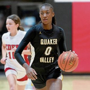 Quaker Valley’s Oumou “Mimi” Thiero drives upcourt against Eden Christian Academy on Dec. 4, 2024.