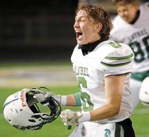Brayden Faulkner yells toward the Laurel supporters after the Spartans upended Fort Cherry, 24-14, in the WPIAL Class A semifinals Friday, Nov. 14, 2025 at Tony Dorsett Stadium at Hopewell.