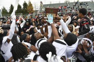 Aliquippa celebrates with the trophy after beating McKeesport in the WPIAL Class 4A football championship Saturday, Nov. 15, 2025 at Pine-Richland High School.