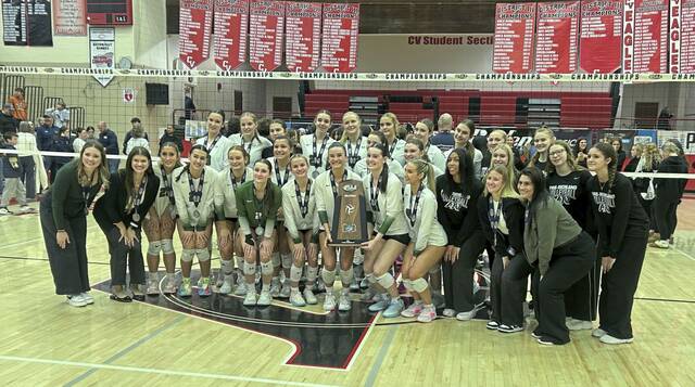 Pine-Richland poses with the runner-up trophy after losing to Spring-Ford in the PIAA Class 4A championship match Saturday, Nov. 15, 2025.
