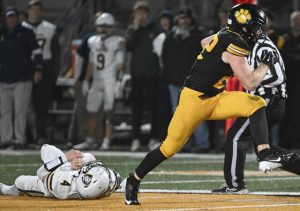 North Allegheny’s Luke Rohan steps through the tackle attempt by Norwin’s Zack Pawling during WPIAL 6A semifinal Friday Nov.7, 2025 at North Allegheny High School.