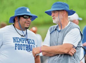 Hempfield’s Ryan Reitz and his father Ray (right) chat during the WCCA Larry Sellitto Memorial 7-on-7 tournament at Latrobe in 2022.