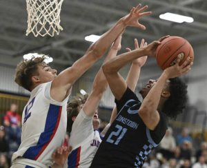 Chartiers Valley’s Julian Semplice defends on Johnstown’s Donte Tisinger during a PIAA Class 5A quarterfinal March 14 at Norwin.