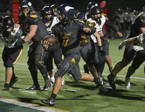 Central Catholic’s Roman Thompson strides into the end zone against North Allegheny during the WPIAL Class 6A championship game Saturday.