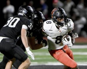 Bethel Park’s David Dennison carries against Upper St. Clair on Oct. 10.