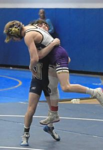 Baldwin’s Jason Alex wrestles Norwin’s Landon Sidun during a 114-pound match at the 2024 WPIAL Class 3A wrestling tournament.