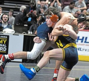 Norwin sophomore Landon Sidun records a takedown in the 2024 PIAA tournament against Ridley’s Curtis Nelson.