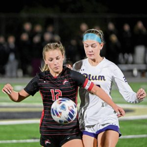Fox Chapel’s Emily McKee works against Plum’s Allison Porter during their WPIAL Class 3A semifinal on Monday, Oct. 27, 2025, at Gateway.