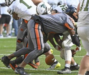Clairtons’ Brandon Murphy causes Laurel’s Kolton Carlson to fumble late in the fourth quarter during the WPIAL Class A football championship Saturday, Nov. 22, 2025 at Acrisure Stadium.