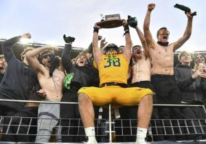 Seton LaSalle’s Will Martin celebrates with the student section after beating Steel Valley during the WPIAL Class 2A football championship Saturday, Nov. 22, 2025 at Acrisure Stadium.