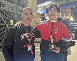 Avonworth assistant football coach Vertus Jones (left) and his son, sophomore Jaden Jones, won their second straight WPIAL Class 3A football championship.