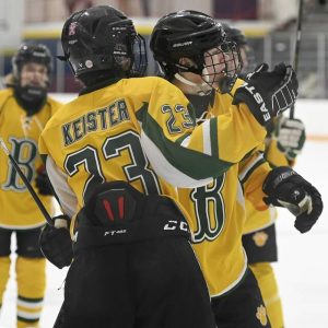 Blackhawk’s Grant Shroads celebrates with Cooper Keister after scoring against Hampton on Thursday, Nov. 20, 2025, at the Brady’s Run Park ice arena.