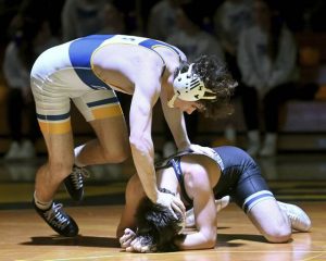 Derry’s Mason Horwat works to defeat Burgettstown’s Jason Murray at 152 pounds during the WPIAL Class 2A team quarterfinals Jan. 29.