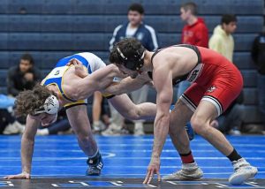 Derry’s Mason Horwat (left) escapes the grasp of Frazier’s Jonah Erdely in the 152-pound finals at the WPIAL Class 2A championships Feb. 22.