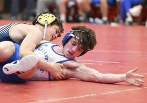 Franklin Regional’s Titus Colangelo beats Connellsville’s Zachary Franks in the 114-pound bout during the WPIAL Class 3A team championship Saturday, Feb. 1, 2025 at Peters Township High School.