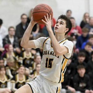 Quaker Valley’s Sam Chapman scores against Avonworth on Jan. 3, 2024.