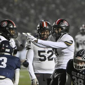 Aliquippa’s Antonio Reddic celebrates a long run to set up the Quips’ first touchdown during their PIAA Class 4A state quarterfinal against Oil City on Friday, Nov. 21, 2025, at Slippery Rock University.