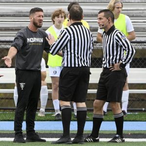 Norwin head coach Scott Schuchert talks with officials after receiving a red card during the Knights’ WPIAL Class 4A quarterfinal against Seneca Valley on Saturday, Oct. 28, 2023, in Jackson.