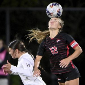Fox Chapel’s Emily McKee heads the ball over Plum’s Madi Stewart during their WPIAL Class3A semifinal on Monday, Oct. 27, 2025, at Gateway.