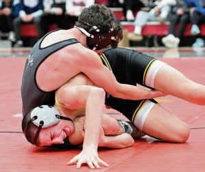 Quaker Valley’s Bruce Anderchak beats North Alleghany’s’ Charlie LaQuatra the 114-pound bout in the Allegheny County Wrestling Championship on Jan. 18 at Fox Chapel.