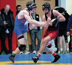 Chartiers Valley’s Makism Rybalko wrestles Elizabeth Forward’s Lucas Boyer in a 145-pound match in the Allegheny County Wrestling Championship on Jan. 17 at Fox Chapel. (Chaz Palla | TribLive)