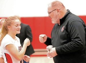 Moe Rosensteel Most Outstanding Player of the Year Award founder Ed Rosensteel (right) presents the 2025 award to Fox Chapel junior Emily McKee before a home basketball game Tuesday against North Hills. (Josh Rizzo | For TribLive)