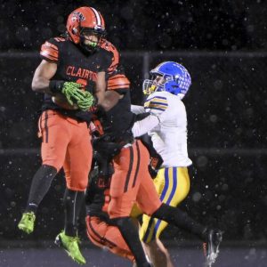 Clairton’s Donte Wright intercepts a pass intended for Greenville’s Justin Schell during their PIAA Class A semifinal last Friday at Helling Stadium in Ellwood City. (Christopher Horner | TribLive)