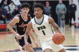 Belle Vernon’s Curtis Wade drives against Avonworth’s Rowan Carmichael in the WPIAL Class 4A semifinals Feb. 22. (Jeff Helsel | Mon Valley Independent)